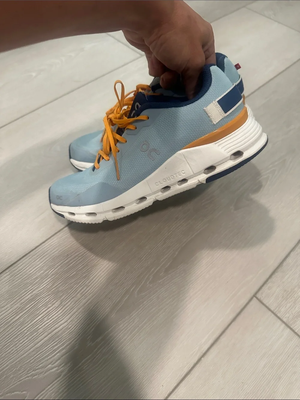 On Lightweight Women's Running Shoes in Light Blue and Orange